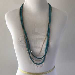 AV Max teal and gold layering necklace